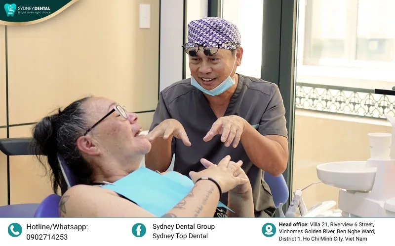 Osseointegration is the biological process where the jawbone fuses directly with the titanium post