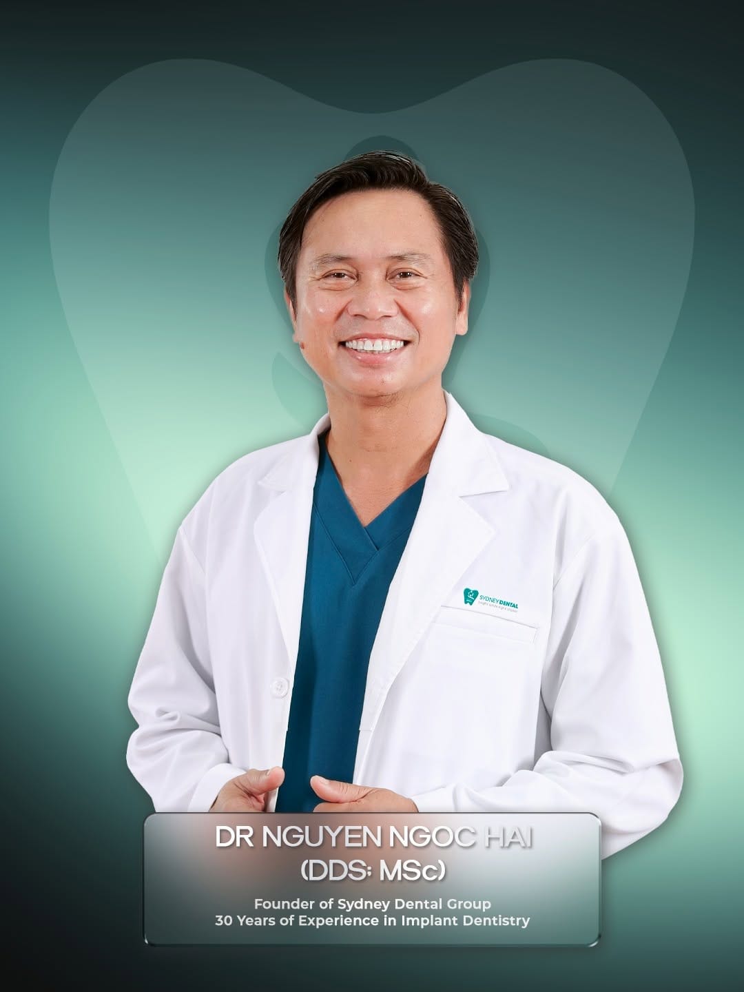 : Dr. Nguyen Ngoc Hai with Thomas Fox, celebrating the successful completion of his full-mouth rehabilitation journey.